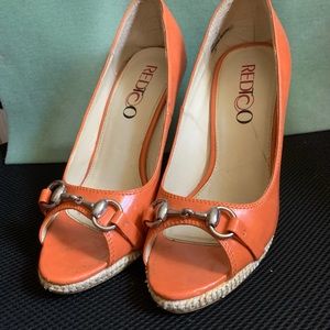 Orange heels approximately 3”